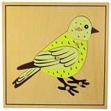 Montessori-style wooden puzzle featuring various animals and plants